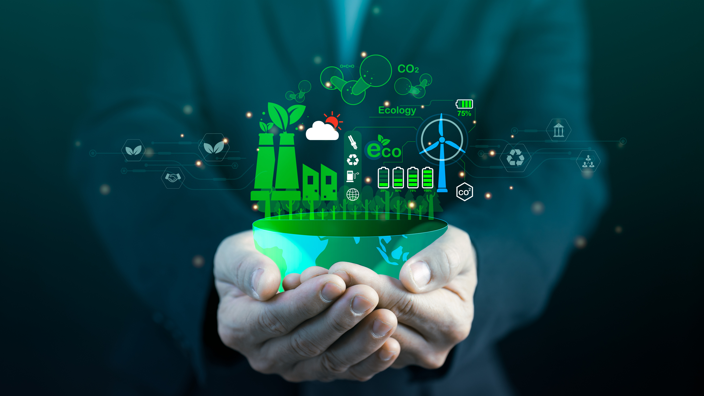 A person holds a holographic display of renewable energy icons, including solar panels, wind turbines, and eco-friendly symbols, representing sustainable technology and environmental conservation.